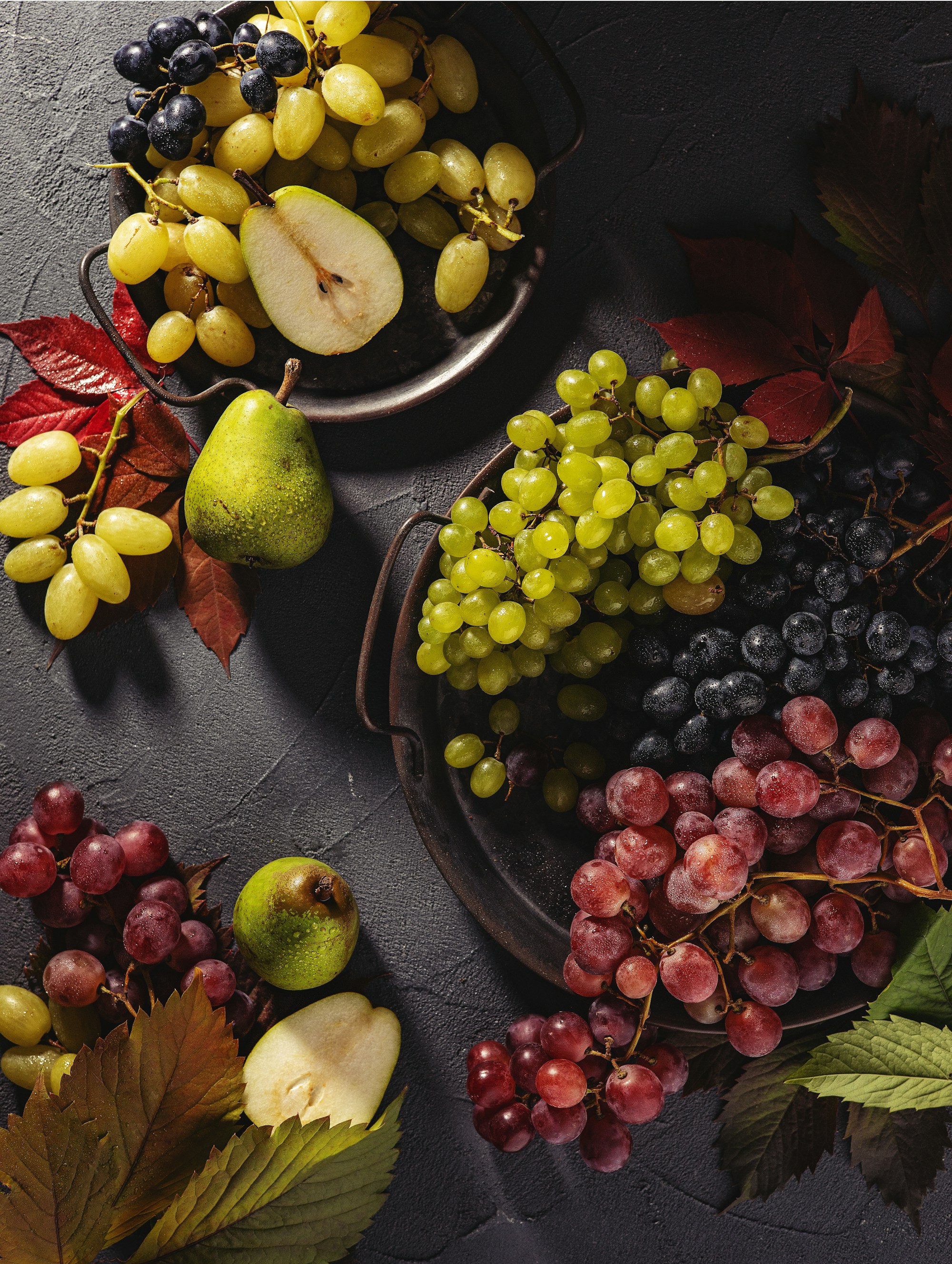 Grapes and pears arranged with seasonal leaves